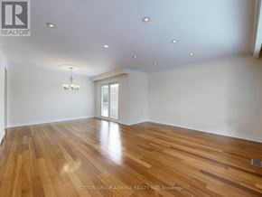 Vaughan (Crestwood-Springfarm-Yorkhill) house for rent - A room with wooden flooring and a chandelier.