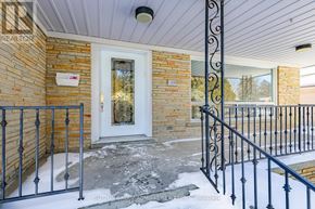 Vaughan (Crestwood-Springfarm-Yorkhill) house for rent - A house entrance with a white door and a black metal railing.