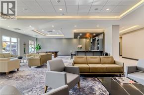 Brantford apartment for rent - A living room with a couch, chairs, and a coffee table.