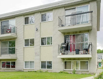 Edmonton apartment for rent - Apartment building with balconies and windows.