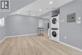 Kitchener house for rent - A laundry room with a washer and dryer.