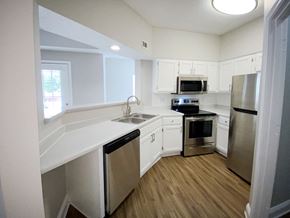 Cordova apartment for rent - Newly renovated kitchen with white cabinets and stainless steel appliances in Cordova apartment for rent