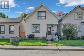 Hamilton (Gibson) house for rent - A house with a brown door and a small porch.