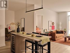 Toronto (Waterfront Communities) condo for rent - A floor plan of a house with a kitchen, two bedrooms, and a laundry room.