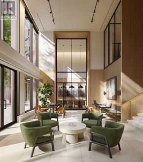 Toronto (Waterfront Communities) condo for rent - A modern living room with green chairs and a coffee table.