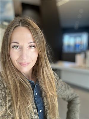 KATERINA HRYB, BAKER REAL ESTATE INCORPORATED