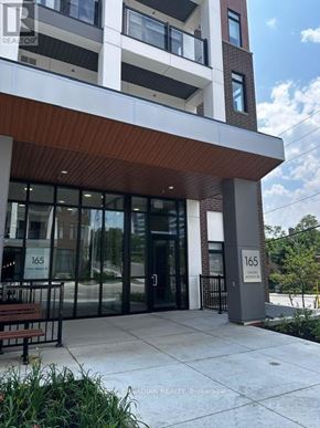 Toronto (Beechborough-Greenbrook) condo for rent - The front of a building with the number 165 on it.