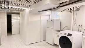 Toronto (Agincourt South-Malvern West) house for rent - A laundry room with a washer and dryer.