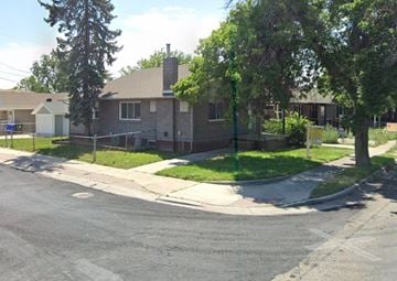 Salt Lake City apartment for rent - A residential area with houses and trees.