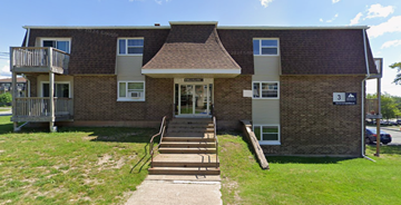 Halifax apartment for rent - A brick building with a sign that says "3" on it.