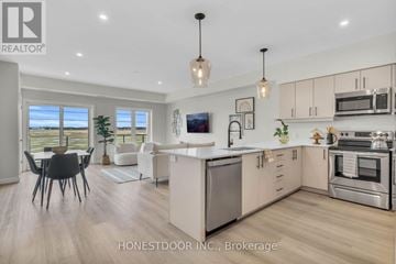 Wellington North (Mount Forest) multi-family for rent - A modern kitchen with a dining table and chairs.