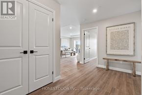 Brockton multi-family for rent - A room with a white door and a framed picture on the wall.