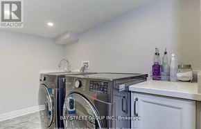 East Gwillimbury (Queensville) house for rent - A laundry room with a washer and dryer.
