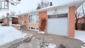 Richmond Hill (Crosby) house for rent - A red brick house with a white garage door and number 401 on the front.