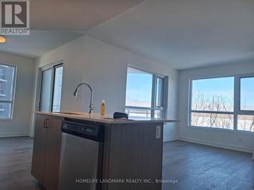 Barrie (Alliance) condo for rent - A kitchen with a dishwasher and a sink.
