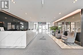 Vaughan (East Woodbridge) condo for rent - A reception area with a marble counter and chairs.