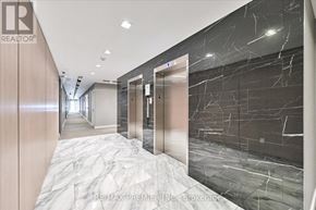 Vaughan (East Woodbridge) condo for rent - A hallway with marble floors and walls, and a logo that reads REALTOR.