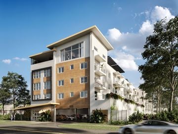 Hollywood apartment for rent - A modern multi-story building with a balcony on the second floor.