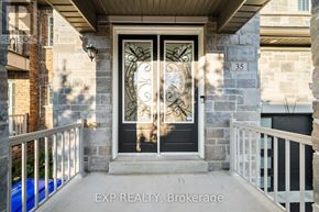 Bradford West Gwillimbury (Bradford) house for rent - A black door with a glass window and a metal design on it.