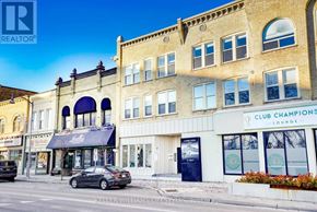 St. Thomas multi-family for rent - A street view of a building with the sign "CLUB CHAMPIONS LOUNGE" on the front.