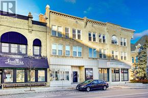 St. Thomas multi-family for rent - A car is parked in front of a building with a sign that says "Club Champions.".