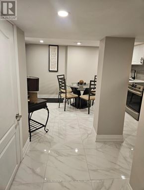 Hamilton (Centremount) house for rent - A living room with a brown couch and a flat screen TV.