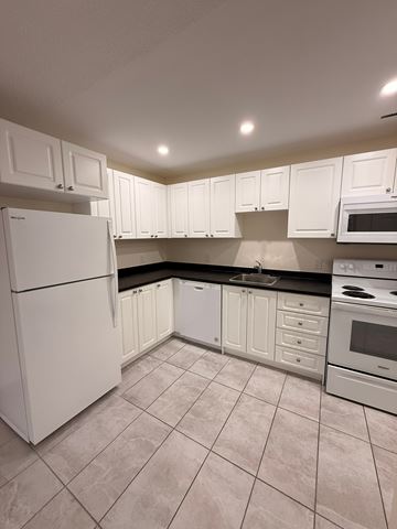 Halifax apartment for rent - A kitchen with white cabinets and appliances.