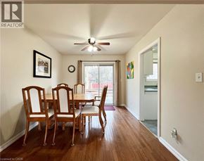 Waterloo house for rent - A dining room with a wooden table and chairs.