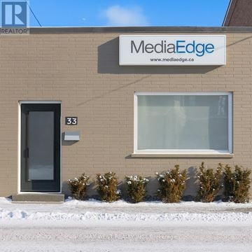 For rent in Toronto (Weston) - A building with a sign that says MediaEdge on it.