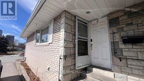 Toronto (Newtonbrook East) house for rent - A house with a white door and a sign that says "For Sale" is shown.