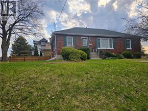 Cambridge house for rent - A house with a green lawn in front.