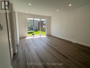 Niagara Falls (Brown) house for rent - A room with EXP REALTY, Brokerage watermark on the floor.