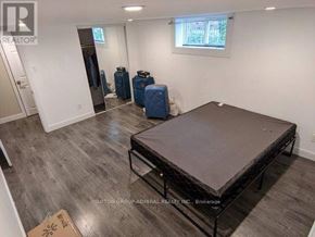 Toronto (Wexford-Maryvale) house for rent - A room with a bed frame in it.