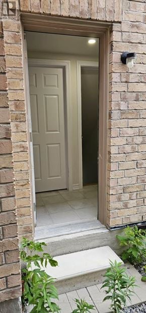 Oshawa (Eastdale) house for rent - A white door is open to a hallway.