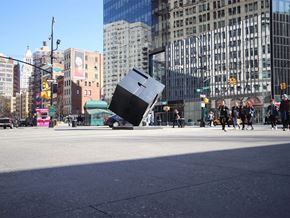 New York apartment for rent - a piece of furniture in the middle of a city street