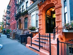 New York apartment for rent - a row of town houses on a city street