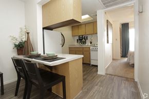 Tempe apartment for rent - a kitchen and dining area with a table and chairs in an apartment