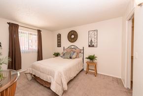 Tucson apartment for rent - a bedroom with a bed and a window