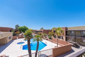Tucson apartment for rent - our apartments have a large pool and palm trees