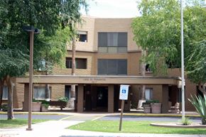Phoenix apartment for rent - an office building with a sign in front of it