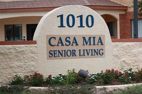 Phoenix apartment for rent - a cement sign with the words senior living on it