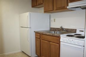 Phoenix apartment for rent - a kitchen with a stove refrigerator and sink