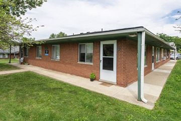 Ann Arbor apartment for rent - the front of a brick building with a porch