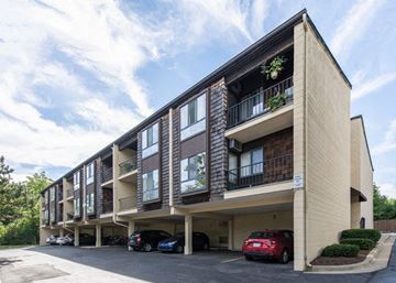 Ann Arbor apartment for rent - a building with cars parked in front of it