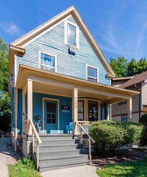 Ann Arbor apartment for rent - a blue house with a porch and stairs