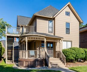 Ann Arbor apartment for rent - the front of a house with a porch and stairs
