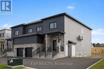 Russell other for rent - A modern building with a stone facade and a metal roof is for sale.