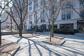 Hamilton (Beasley) condo for rent - A city square with trees and buildings in the background.