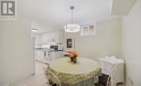 Ajax (Central West) house for rent - A dining room with a table set for two and a white chair.