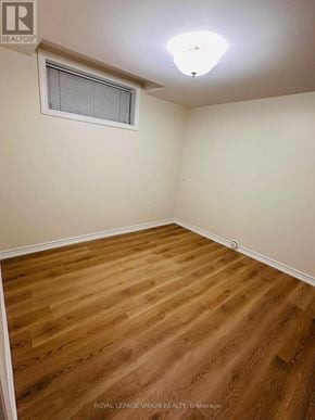 Ajax (Central West) house for rent - A room with wooden flooring and a window with blinds.